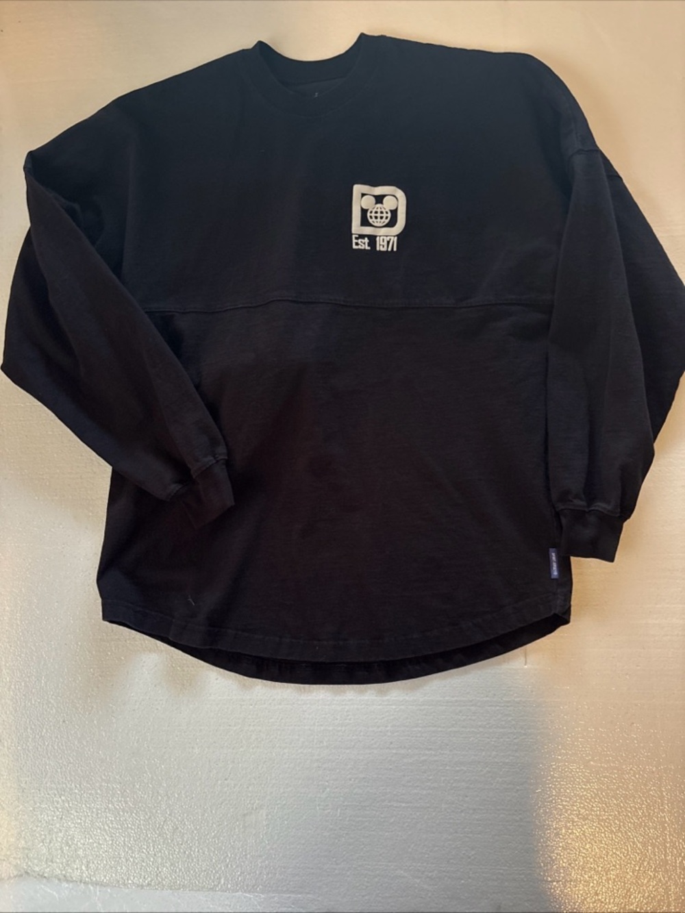 Disney Black Long Sleeve Pullover with White Chest Logo Spirit Jersey